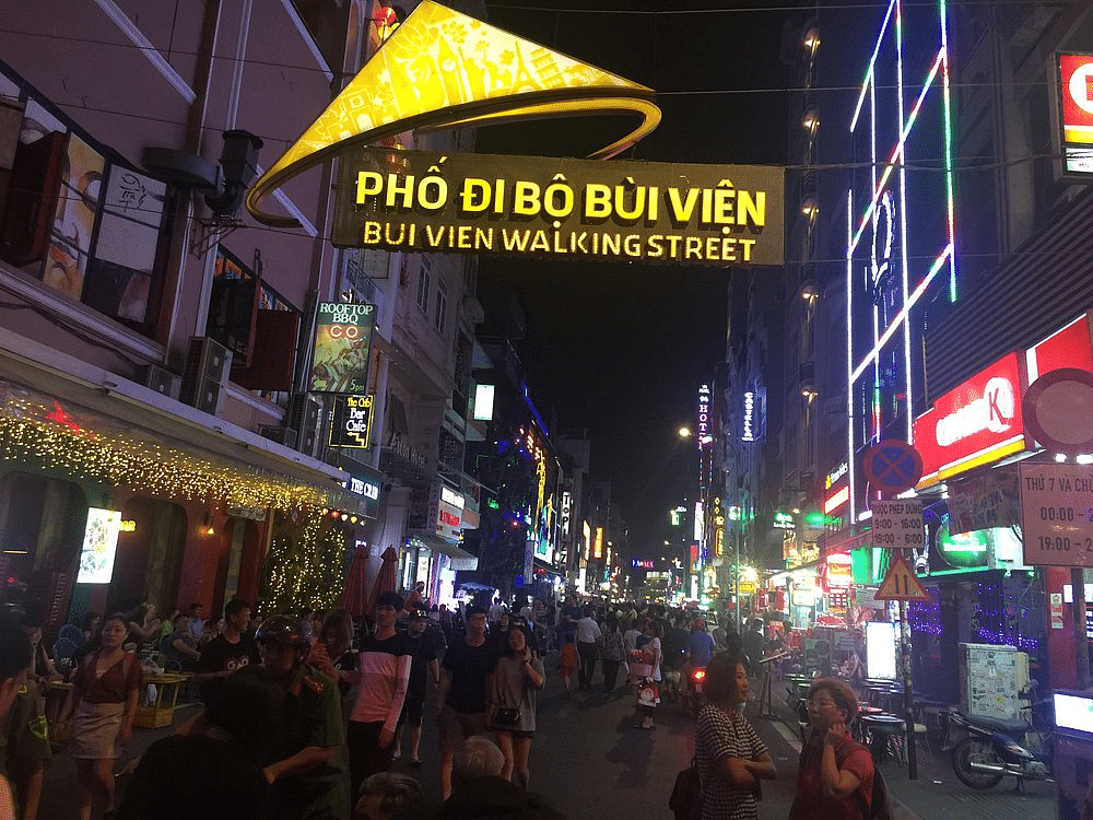 a-simple-view-of-the-entrance-to-bui-vien-walking-street-with-people-all-around