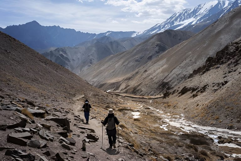 man-woman-trekking-on-markha-valley